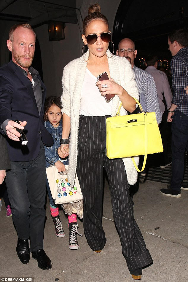 Jennifer Lopez in black pinstripe pants in LA on December 28 ~ I want her  style - What celebrities wore and where to buy it. Celebrity Style