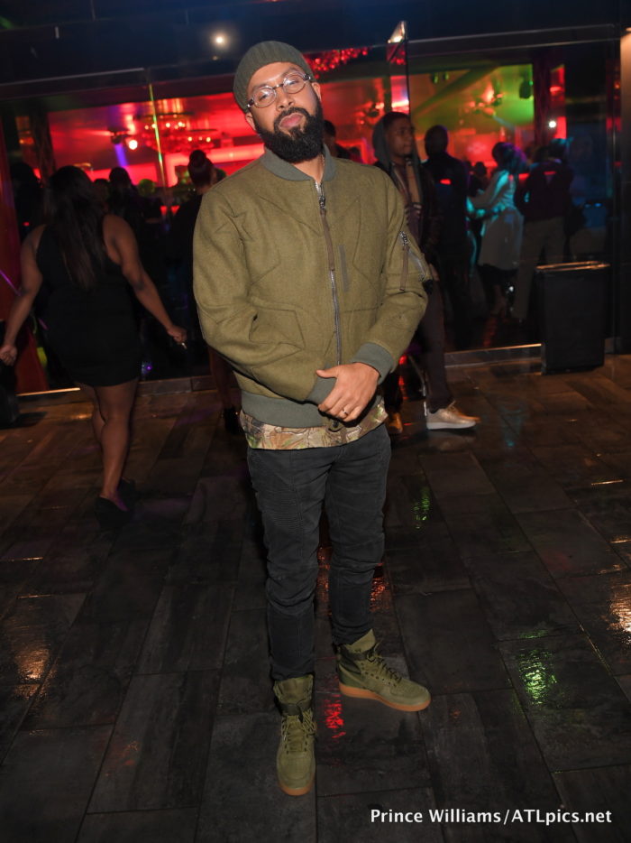 kenny-burnss-nelly-compound-valentino-star-motif-olive-green-jacket-balmain-jeans-and-nike-sf-utility-air-force-1s