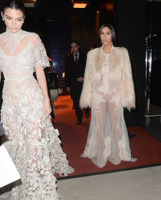 kim-kardashian-wears-givenchy-fall-2010-sheer-gown-and-fur-coat-kendall-jenner-wears-elie-saab-and-kylie-jenner-wears-vetements-camo-coat-for-shoot-on-oceans-eight