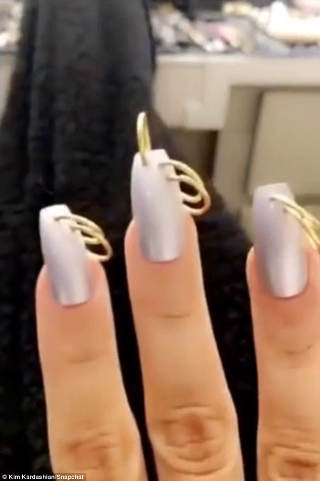 kim-kardashian-pierced-nails-1