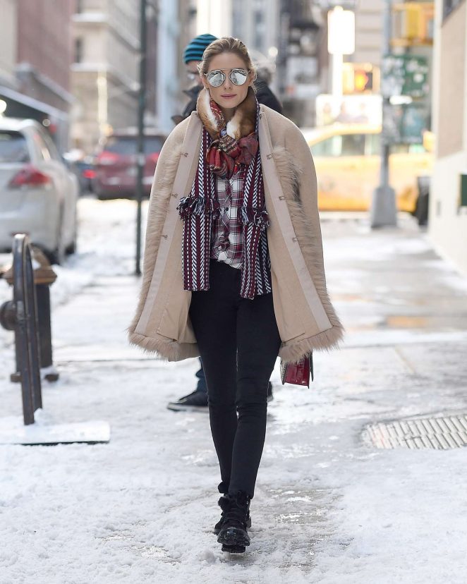 olivia-palermo-wearing-a-fur-coat-while-walking-in-the-snow-analeena