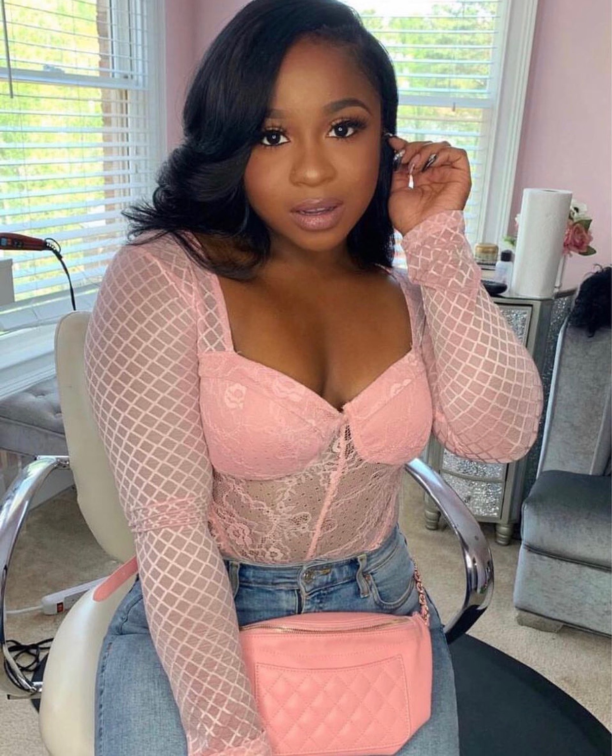 Reginae Carter gave us heart eyes in this sweet pink laced bodysuit from Fa...