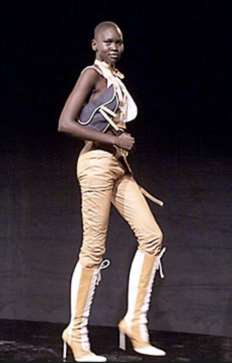 Cardi B Poses in a Custom Louis Vuitton Look By Sir Baba Jagne, a Louis  Vuitton Reverse Monogram Bag and LV Logo Hair – Fashion Bomb Daily