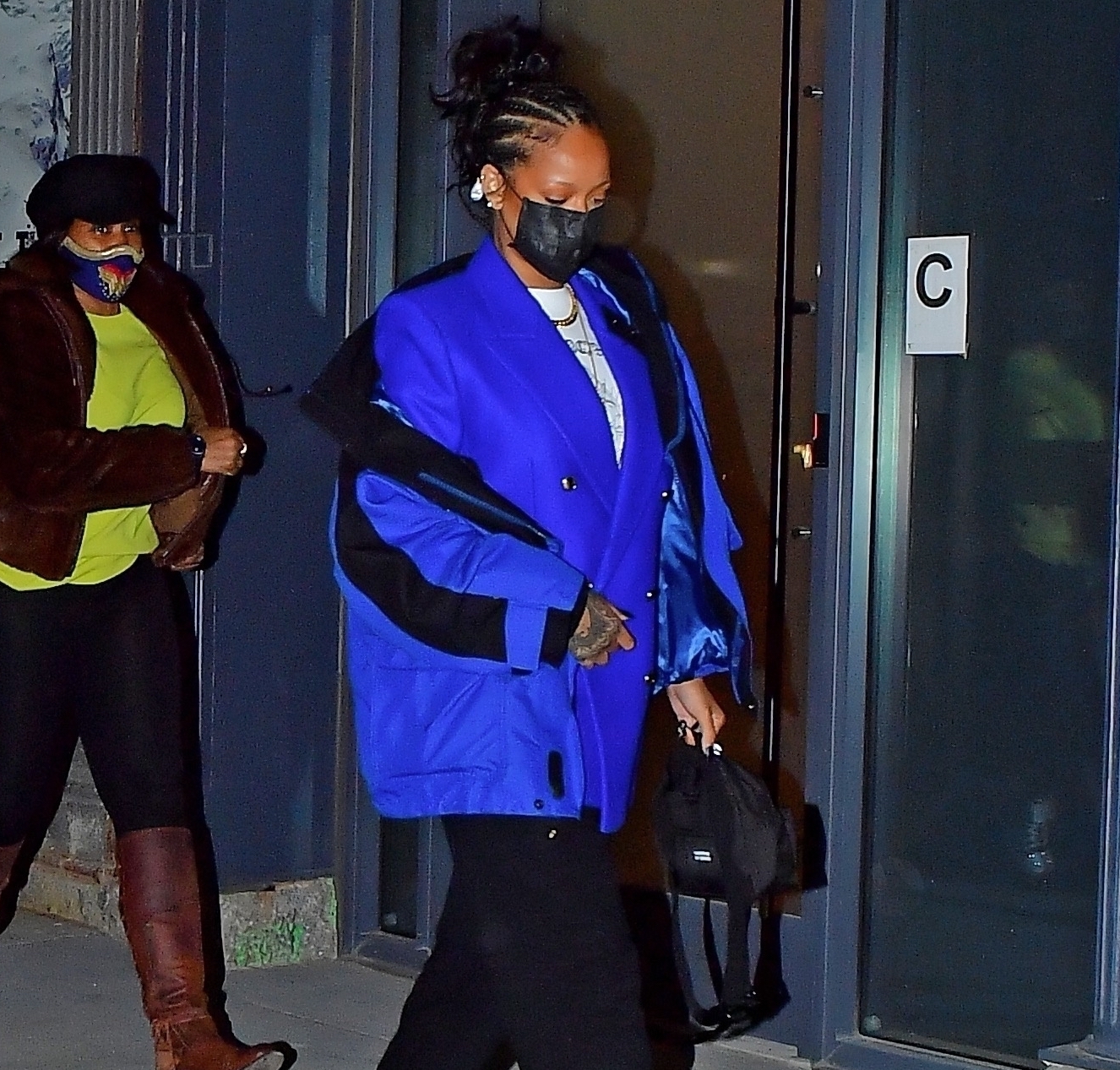 Rihanna Steps Out NYC in a Blue Off the Shoulder Balenciaga Tech Jacket, Double Button Blazer, and the Attico White Pumps
