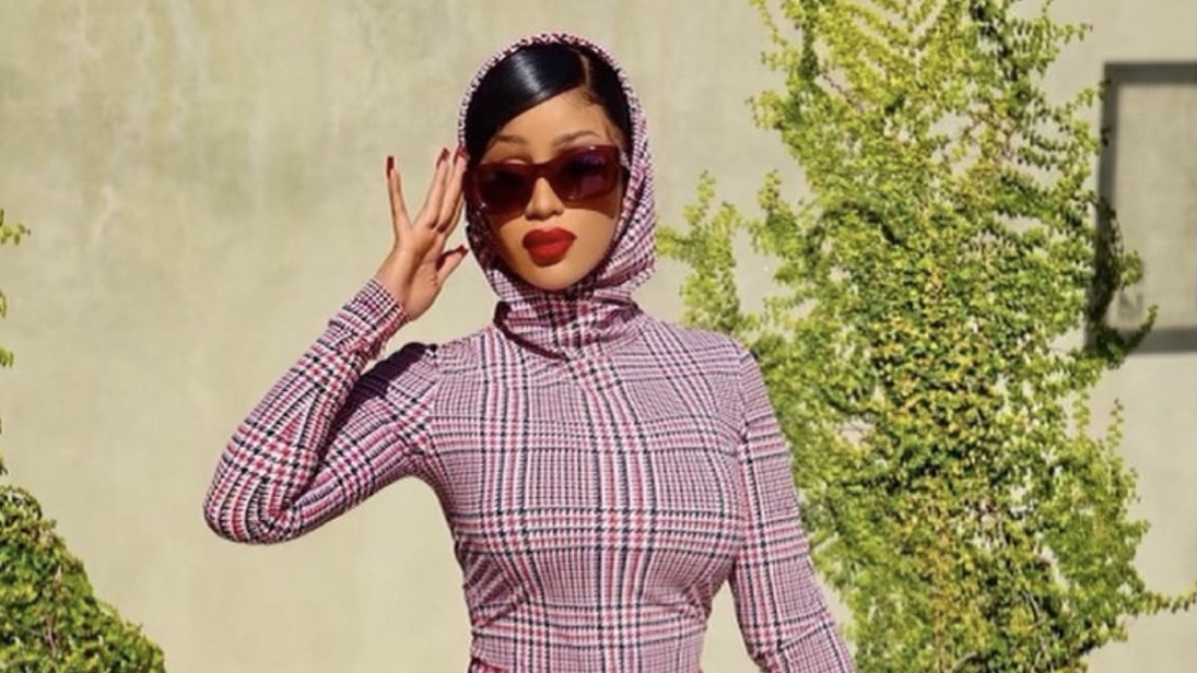 Cardi B Announces the Launch of Her Doll With 'Real Women Are' Wearing  Burberry Look Including Houndstooth Check-Print Hooded Top and Matching  Mini Skirt With Tartan Nylon and Leather Bag