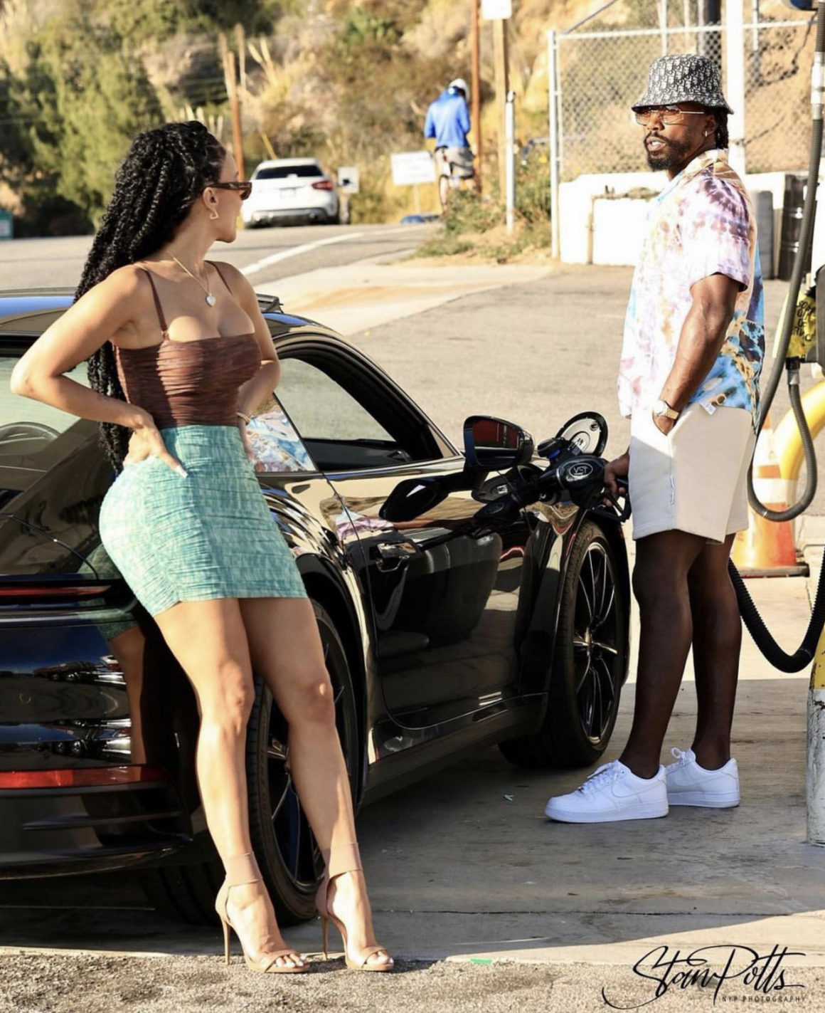 Draya Michele Spotted with Tyrod Taylor in Malibu Wearing House of CB Brown Sleeveless Mesh Bodysuit and Tie Dye Ruched Mesh Mini Skirt2