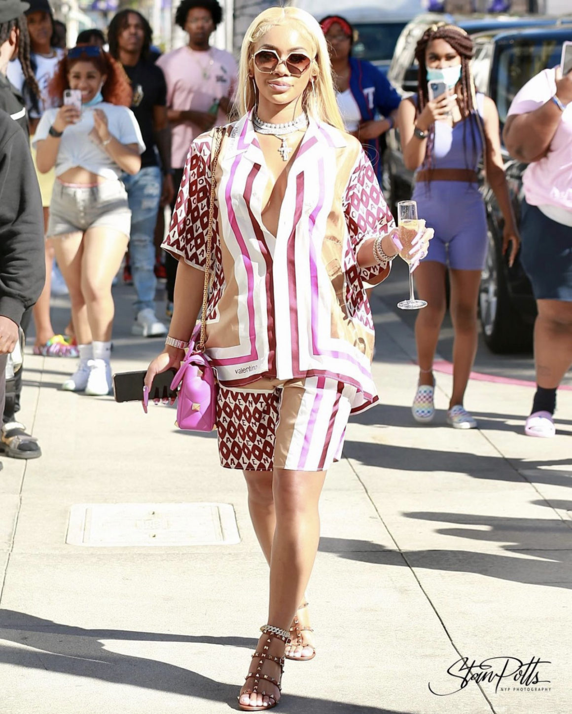 Saweetie Enjoys a Day of Shopping in Beverly Hills Wearing a Valentino Silk Short Sleeve Shirt and Short Set