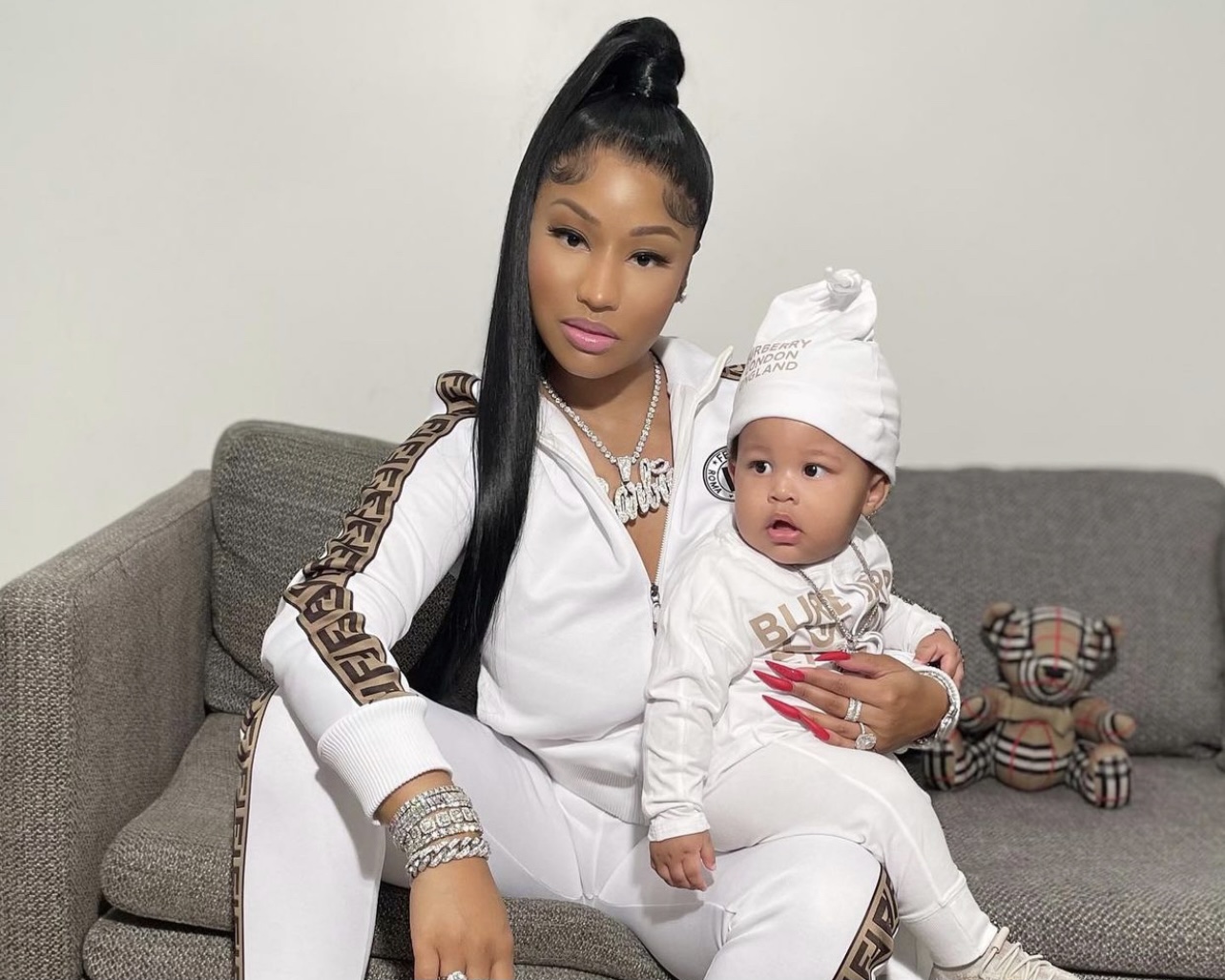 Nicki Minaj Holds Her Baby Boy Wearing Fendi Brown Logo Side