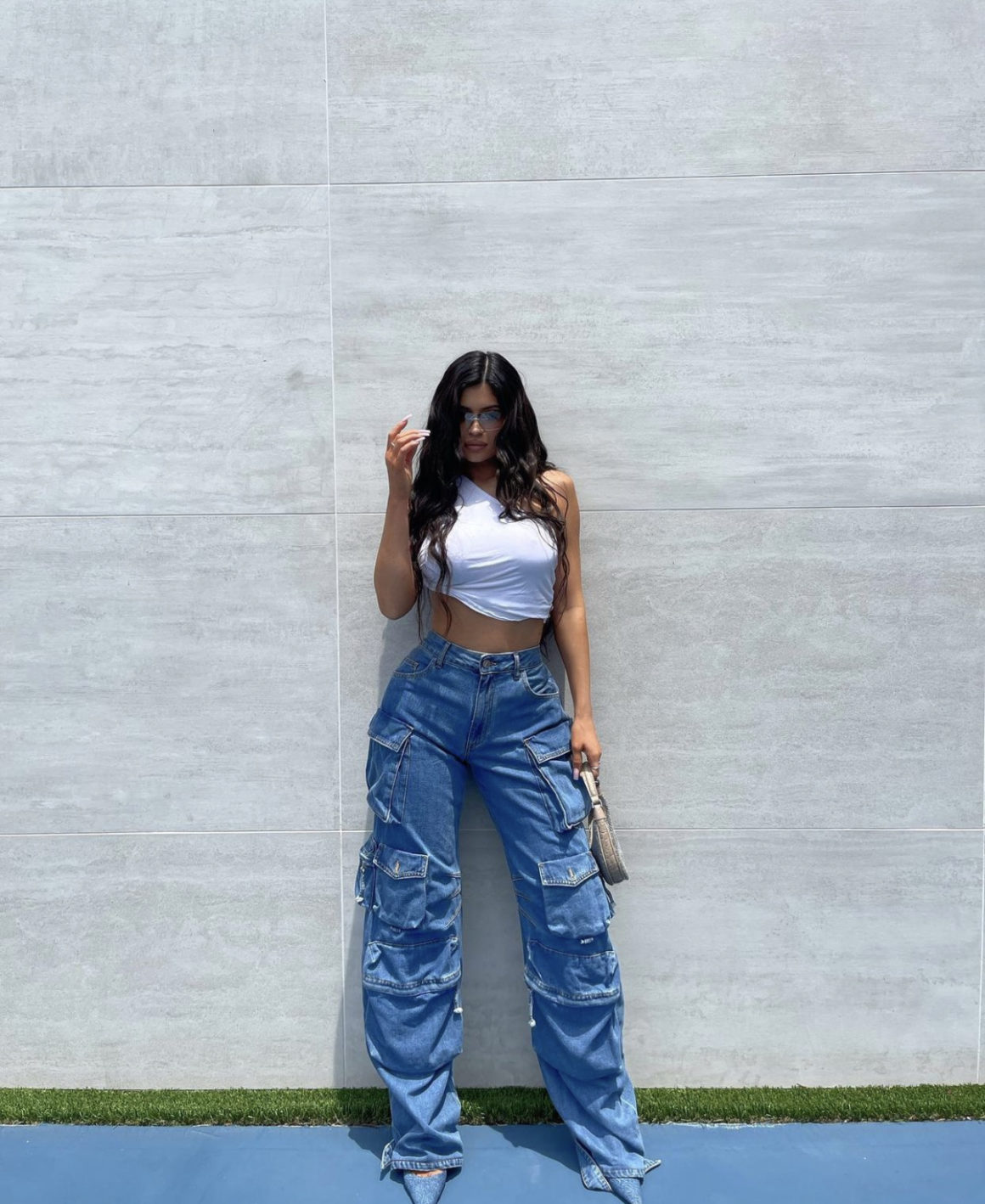 Most Requested: Kylie Jenner Poses in White One Shoulder Crop Top, the  Attico Cargo Jeans and Alexander Wang Denim Pumps – Fashion Bomb Daily