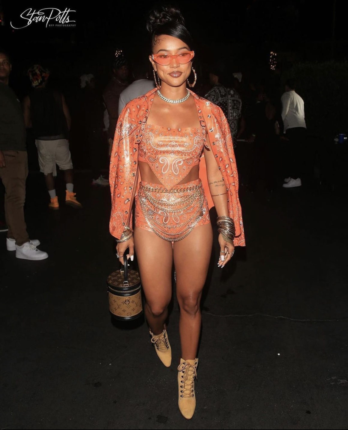 On the Scene at Saweetie's Freaknik Birthday Party: Saweetie in Louis  Vuitton-Inspired Look by Mario De La Torre, Chloe Bailey in Bryan Hearns  Orange Outfit, JT in L.O.C.A. Yellow Set, Yung Miami