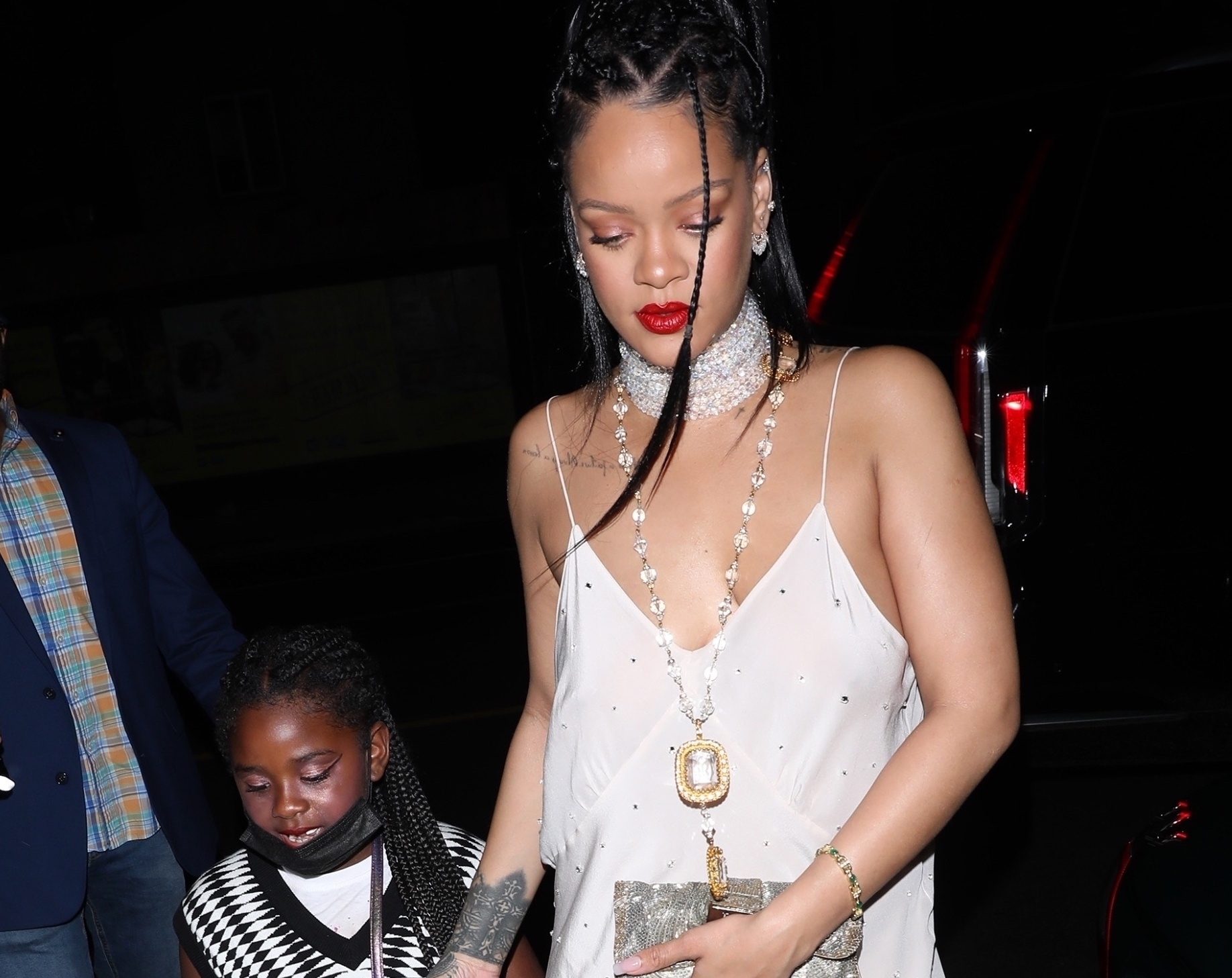 https://fashionbombdaily.com/wp-content/uploads/2021/08/1-Rihanna-Grabs-Dinner-with-Niece-Majesty-in-Miu-Miu-Pink-Crystal-Embellished-Slip-Dress-1.jpg