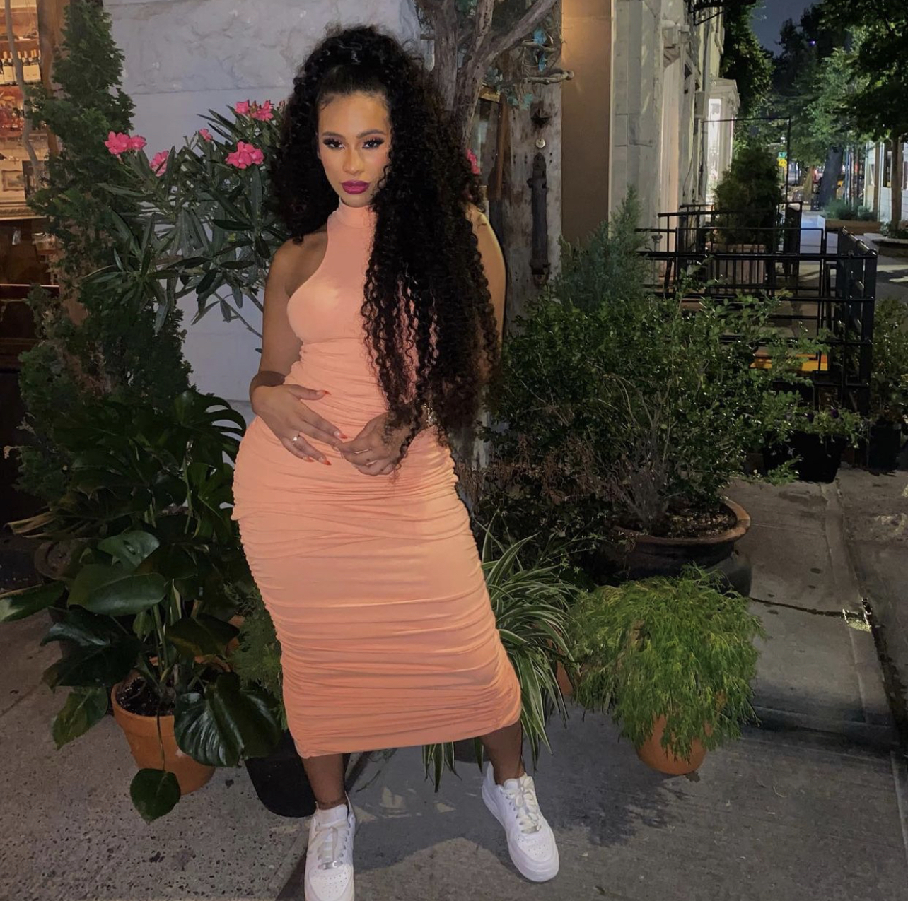 Cyn Santana Poses in Fashion Nova Orange Mock Neck Ruched Dress ...