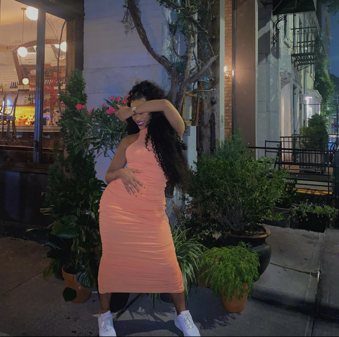 Cyn Santana Poses in Fashion Nova Orange Mock Neck Ruched Dress ...