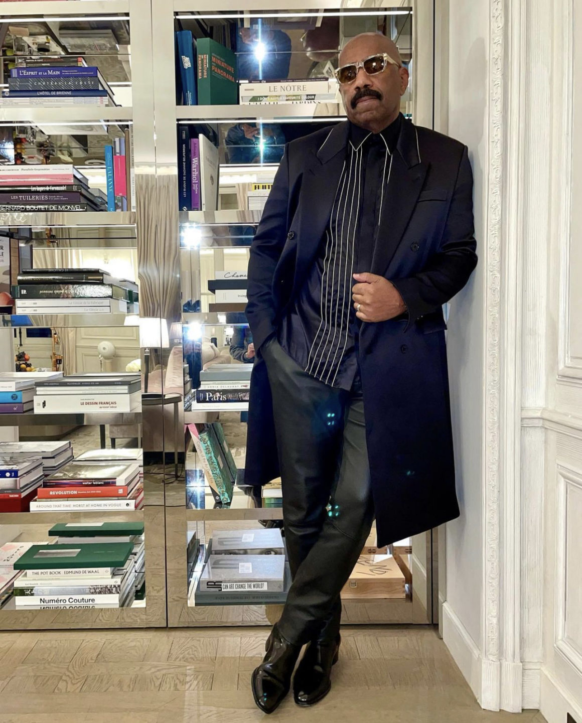 Marjorie and Steve Harvey Serve All Black Style Moment During Night Out in Paris Steve Wears Fendi Fall 2021 Black Satin Coat and Striped Shirt With Dolce and Gabbana Leather Pants