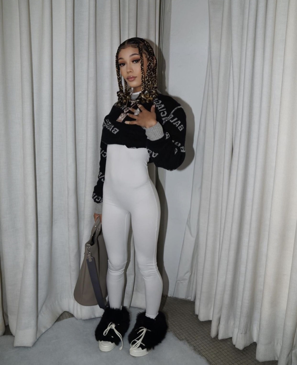 Coi Leray Rocks Black and White Look Featuring Fashion Nova White High-Neck  Long Sleeve Jumpsuit – Fashion Bomb Daily