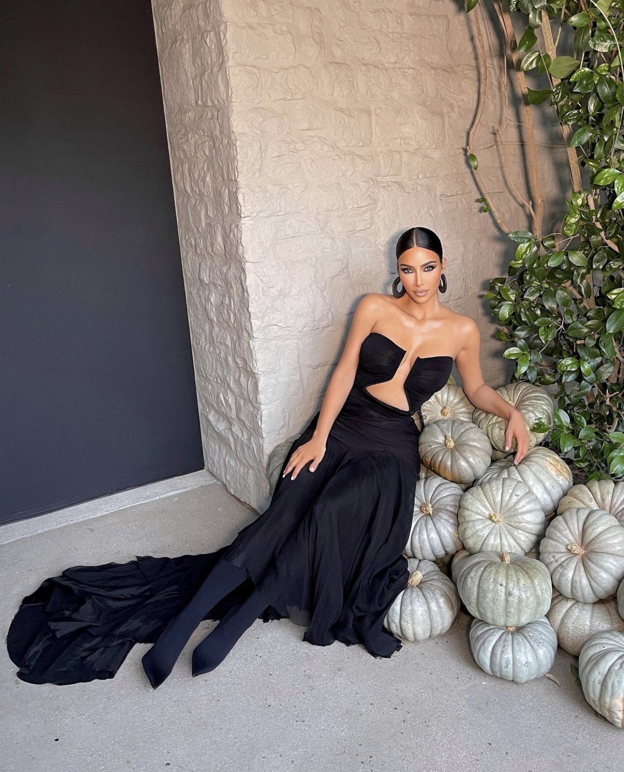 Kim Kardashian Wears Rick Owens SpringSummer 2022 Black Strapless Cutout Dress to Paris Hilton and Carter Reums Wedding