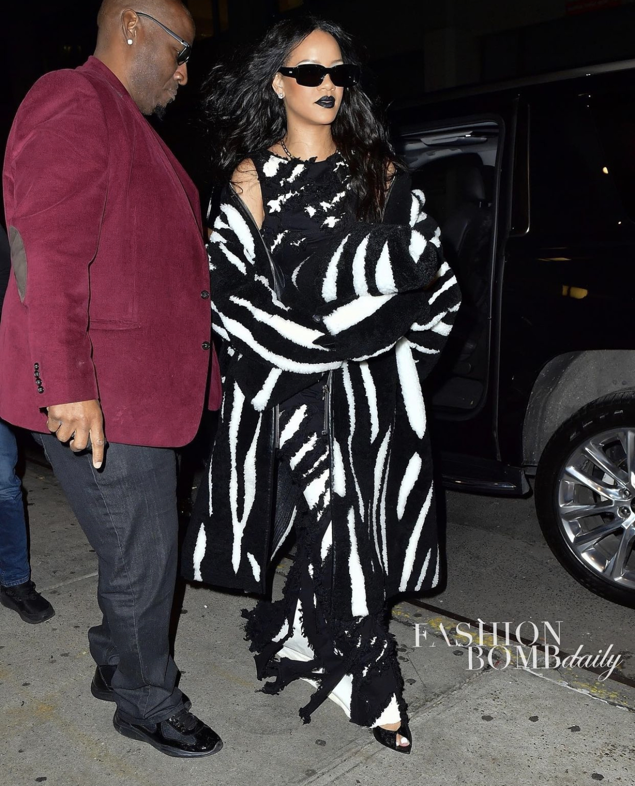 Rihanna Wears Rick Owens Black and White Distressed Dress and Coat While Heading to Halloween Party in NYC