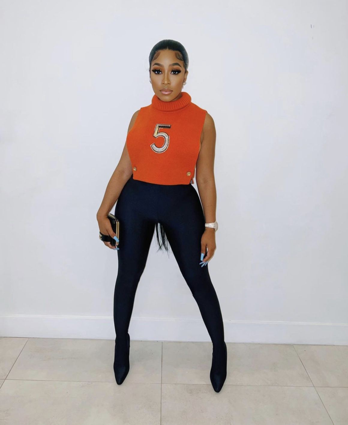 Who Wore It Better: Joie Chavis and Yung Miami Spied in Chanel Fall 2021  Red Embroidered Sleeveless Turtleneck Top – Fashion Bomb Daily