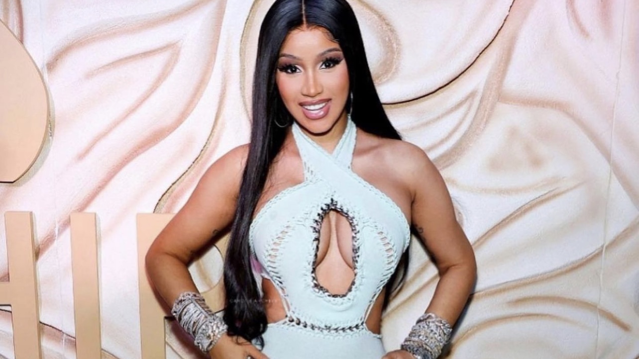 Cardi B Wears Mark Fast Mint Halter Cutout Catsuit at Her Whipshots Launch Party in Miami cover