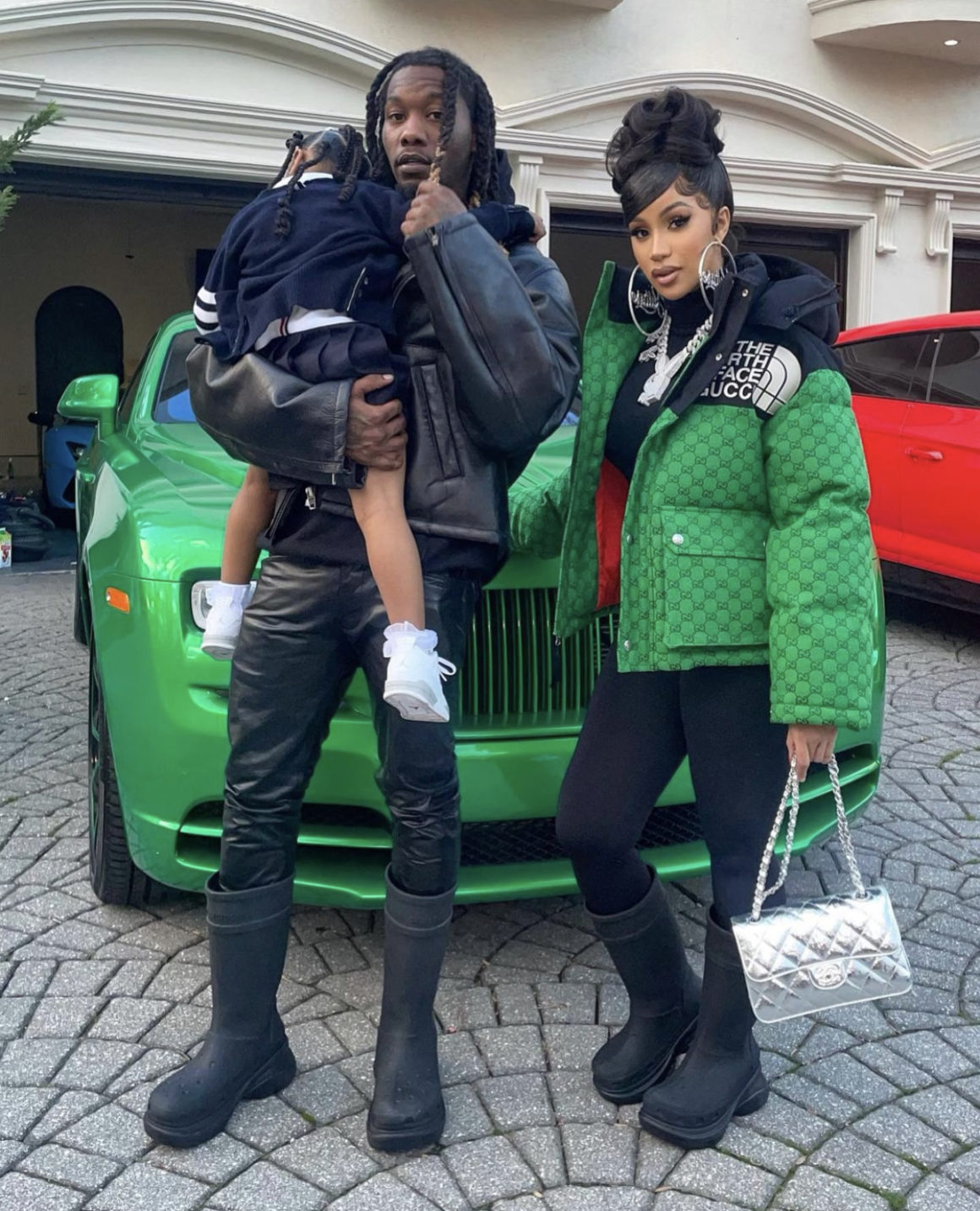 Cardi B and Offset Rock Matching Balenciaga x Crocs Black Boots While  Attending Bulls and Hawks Game in Atlanta: Cardi B Pairs Her Boots with  Gucci x North Face Green Black Logo