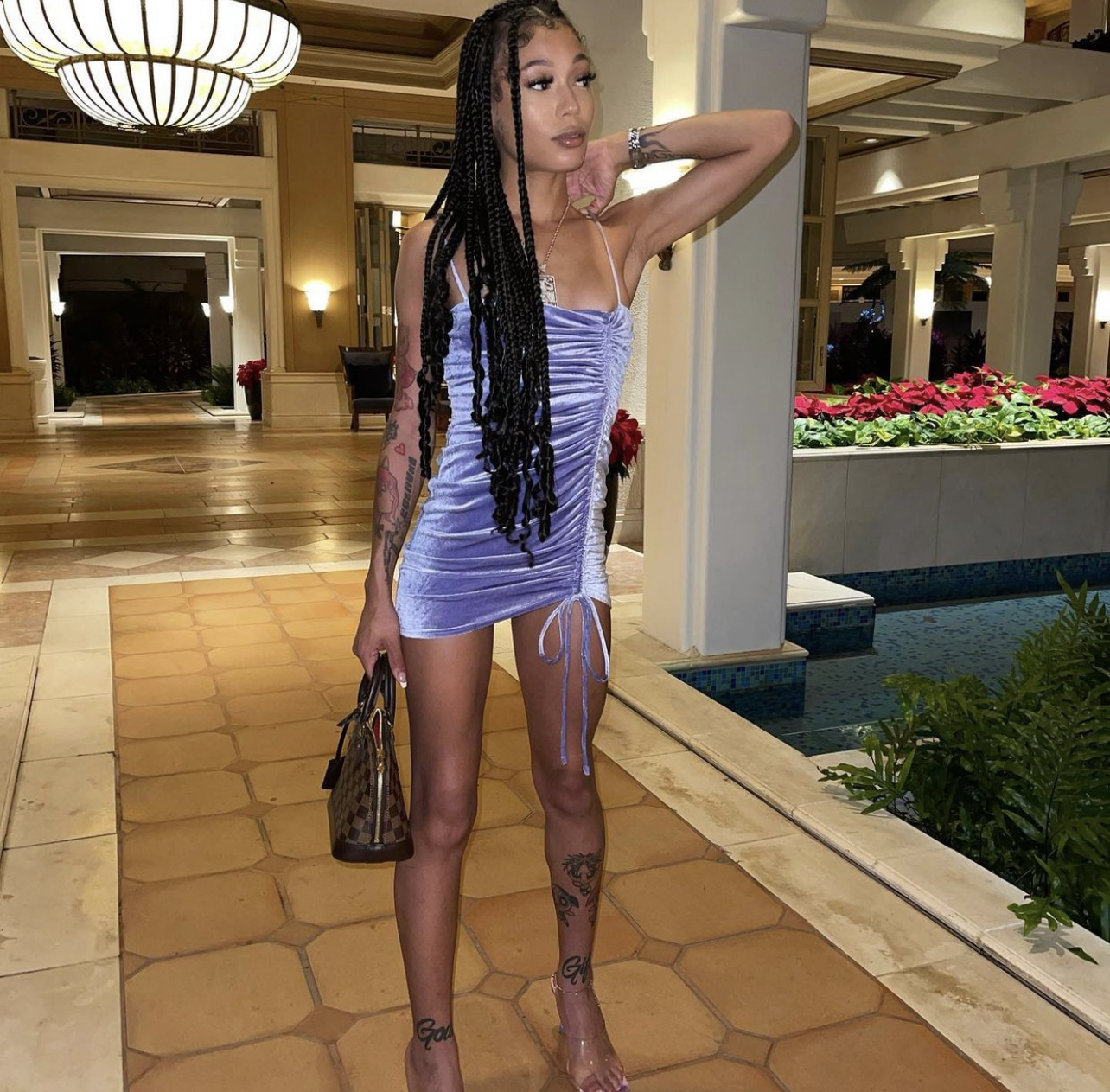 Coi Leray Steps Out For Night Out In Maui Wearing Fashion Nova Light Purple Ruched Velvet Mini