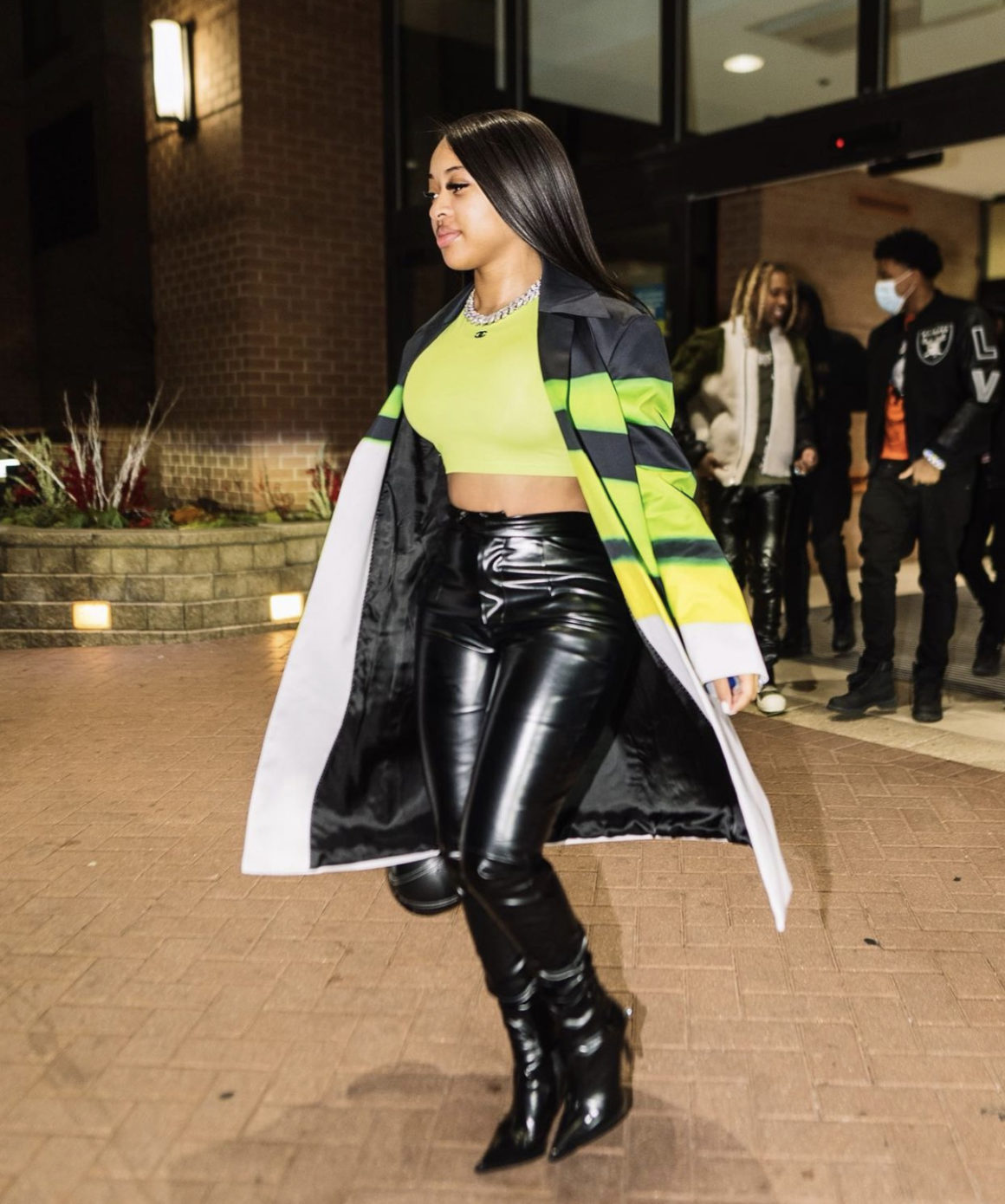 India Royale Steps Out in Neon Green and Black Look Featuring Fashion Nova Black Leather Pants2
