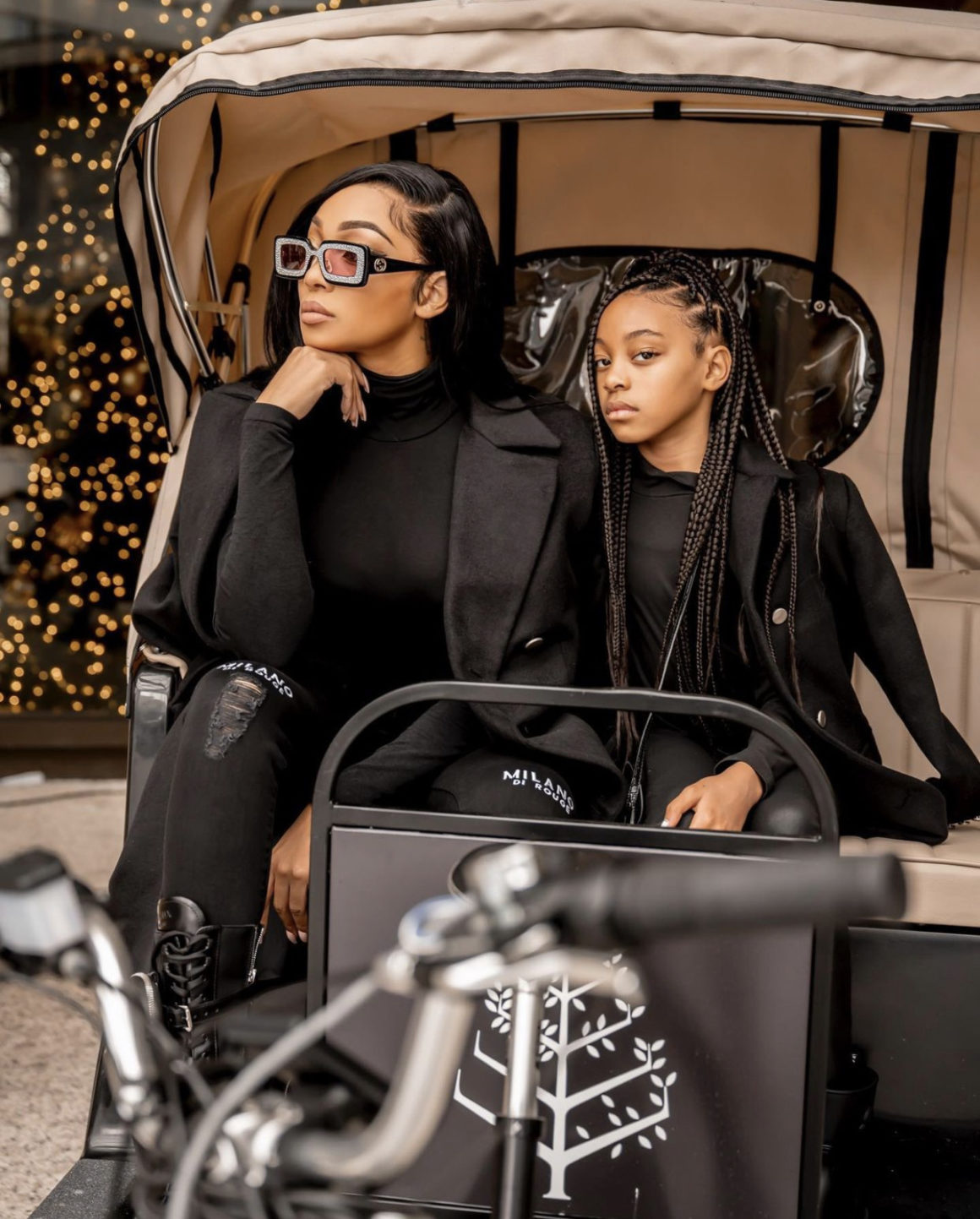 Monica and Daughter Laiyah Get Fly Together in Matching Black Milano Di Rouge Black Trench Coats3