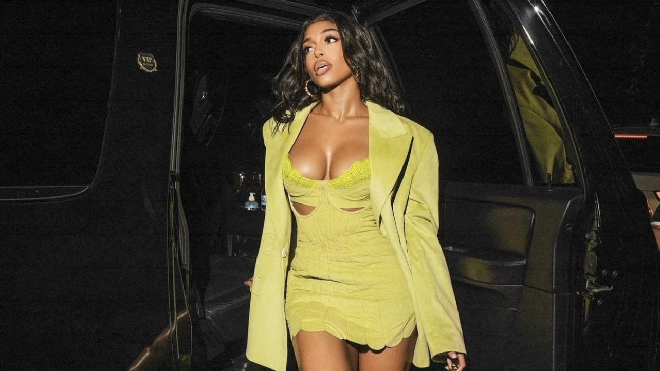 Most Requested Lori Harvey Rocks GCDS Green Blazer Jacket and Shell Mini Dress During Night Out cover