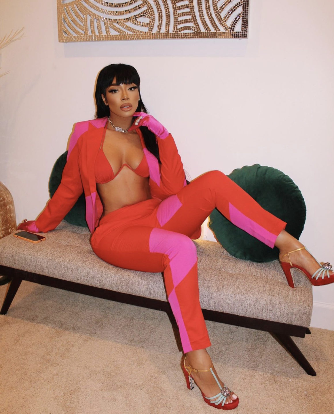 Tommie Spied in Red and Pink Striped Suit from Fashion Nova3