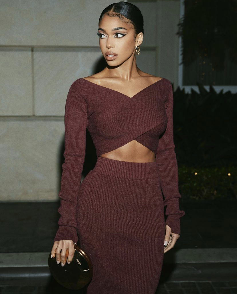 Lori Harvey Attended a Burberry Take Over Event Wearing a Burberry Maroon  Burgundy Knit Crop Top and Skirt Set