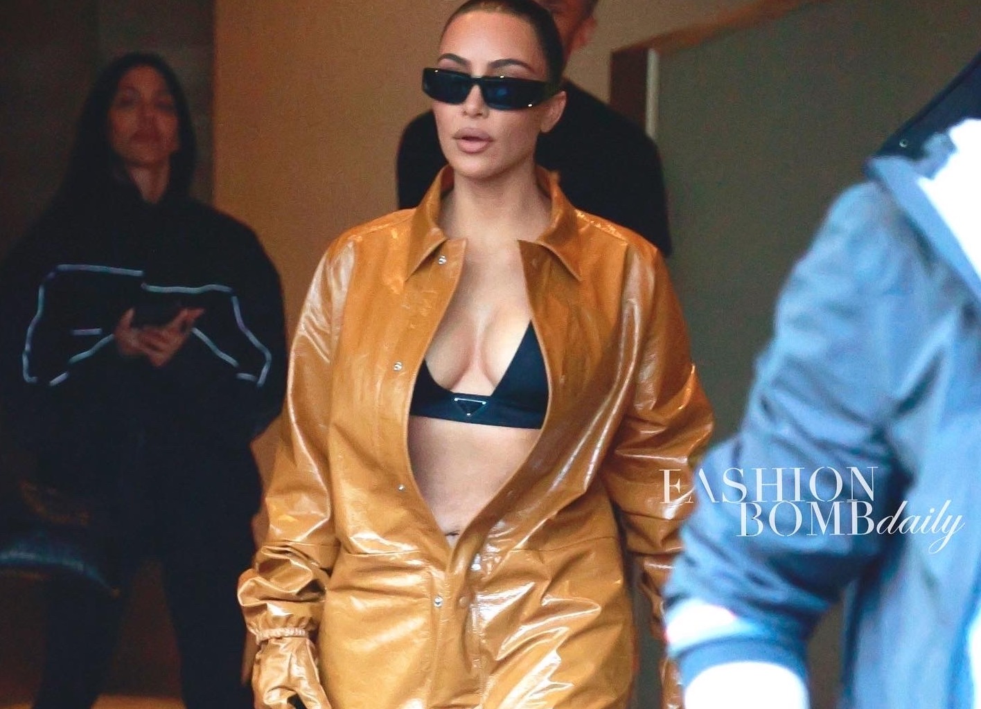 Hot! or Hmm..? Kim Kardashian 's Milan Prada Triangle Top and Yellow Brown  Leather Jumpsuit
