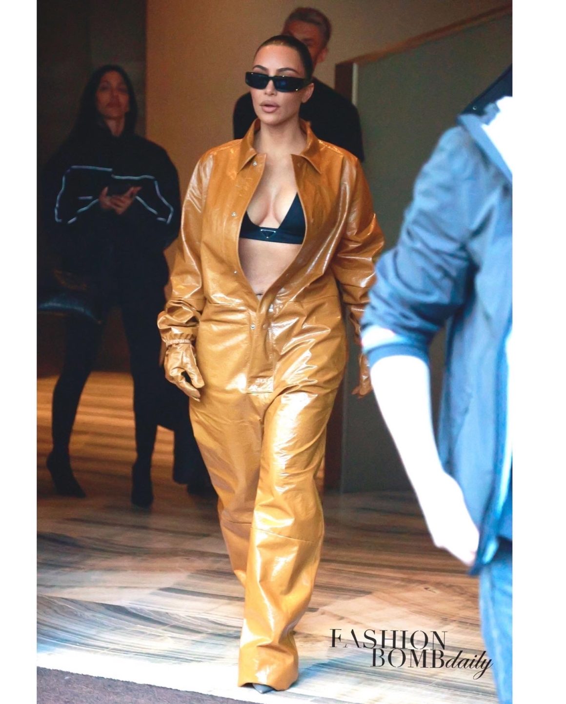 Hot! or Hmm..? Kim Kardashian 's Milan Prada Triangle Top and Yellow Brown  Leather Jumpsuit