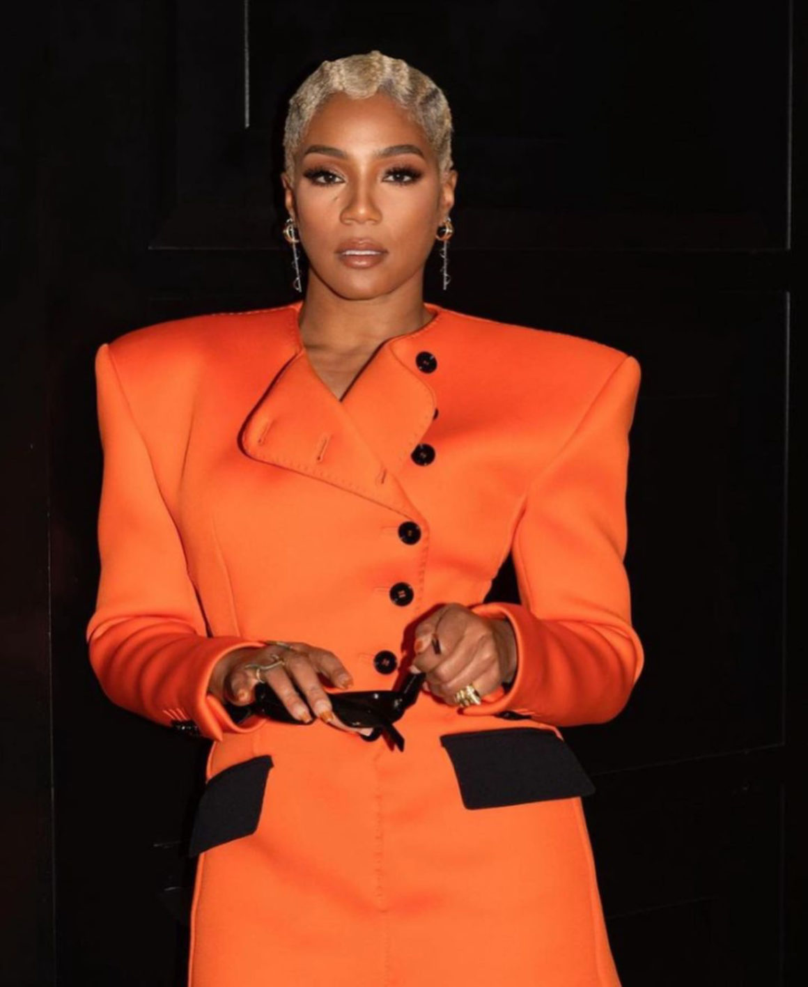 Tiffany Haddish attends Grammys Afterparty in Custom Orange and Black Dolce  Gabbana Dress