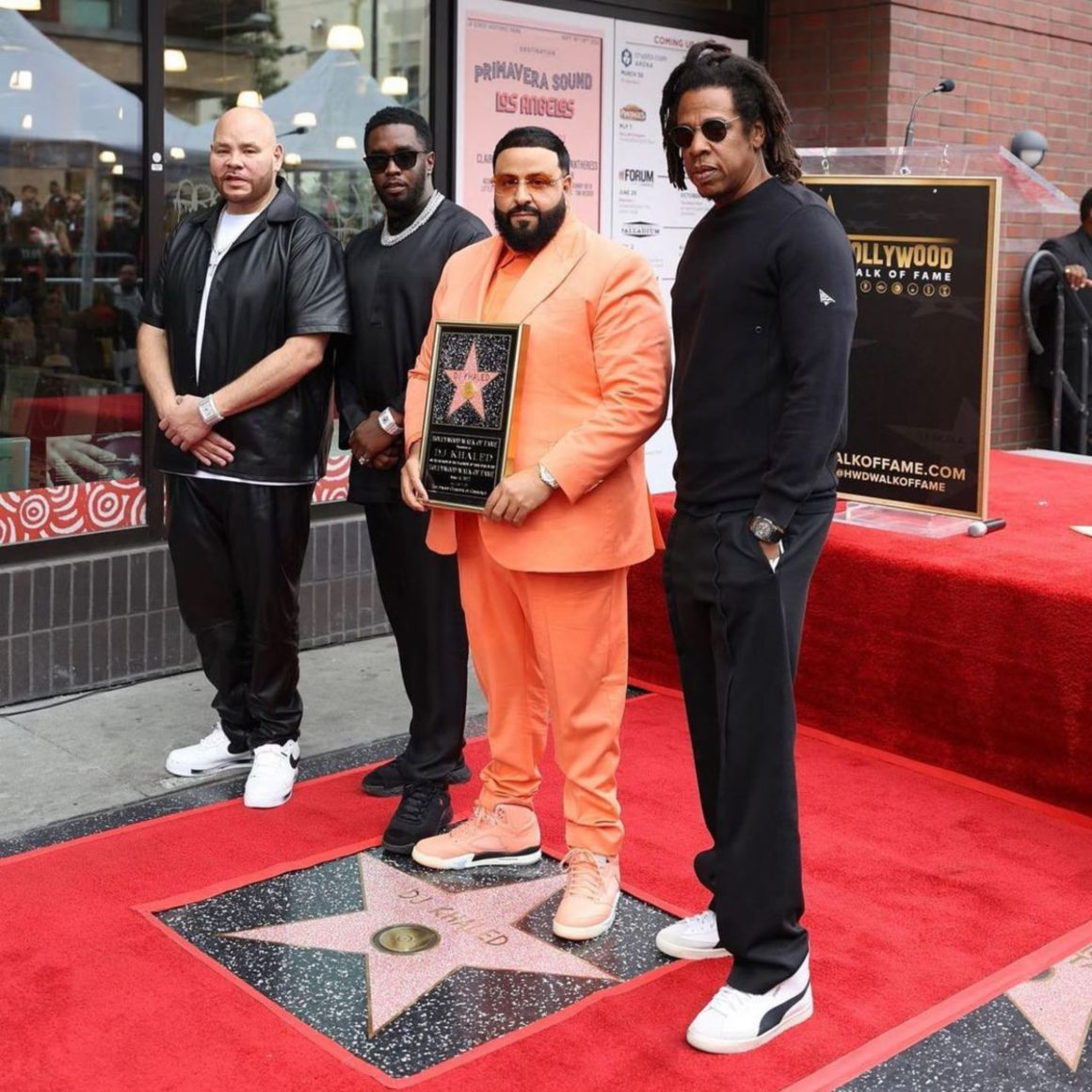 The jean Louis Vuitton purple worn by DJ Khaled on the account