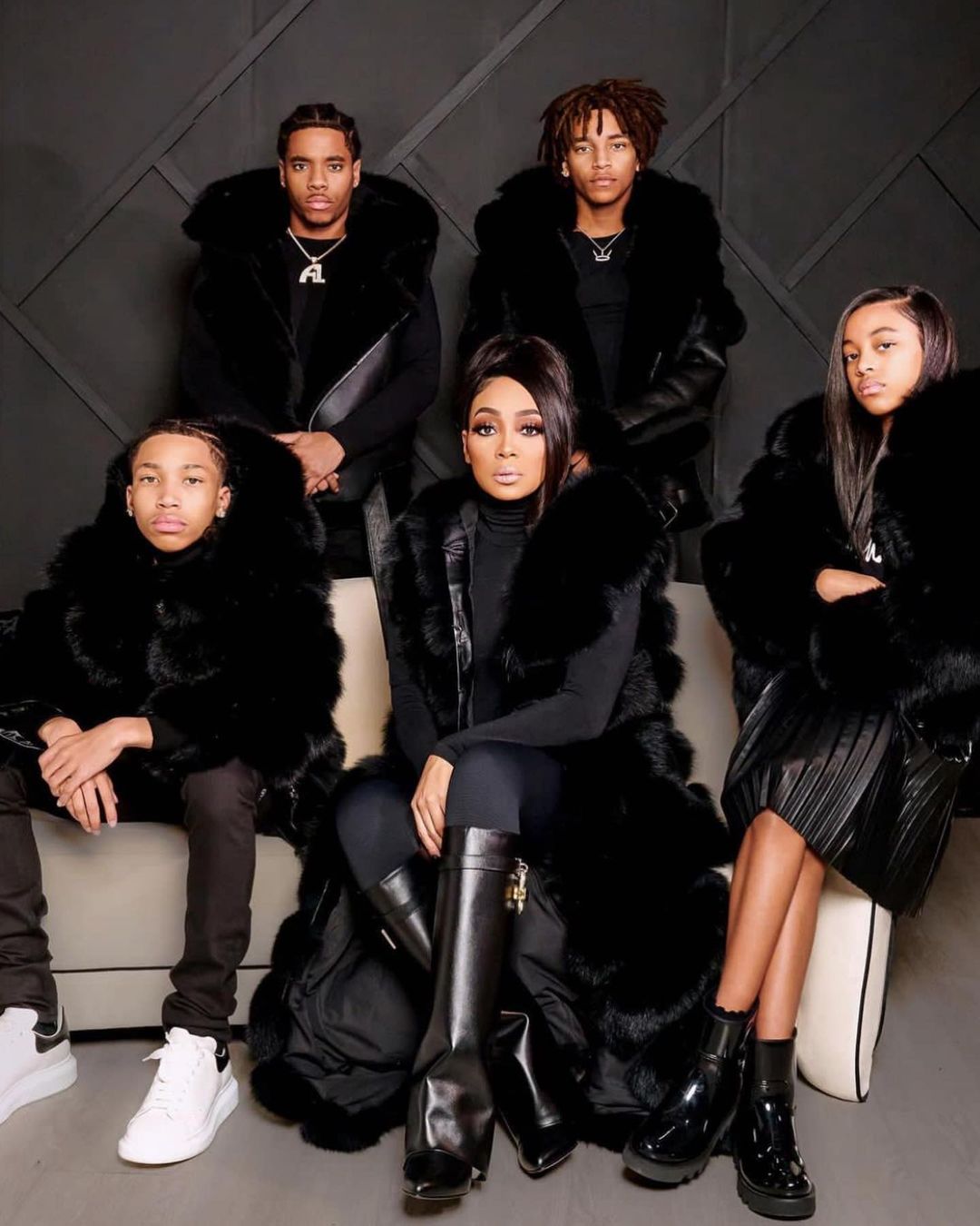 A Bomb Family Portrait Monica Denise and Family Posed in Matching Daniels Leather Get the Look1