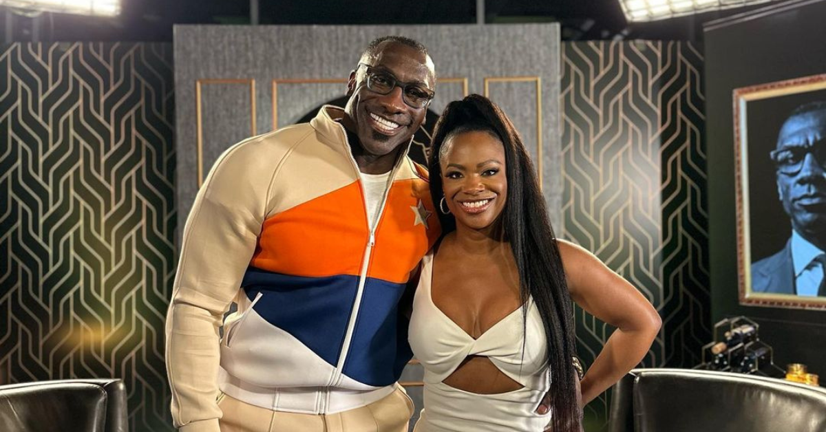 Shannon Sharpe Welcomes Kandi Burruss Onto His Talk Show Wearing a Striped Tracksuit by Starstruck