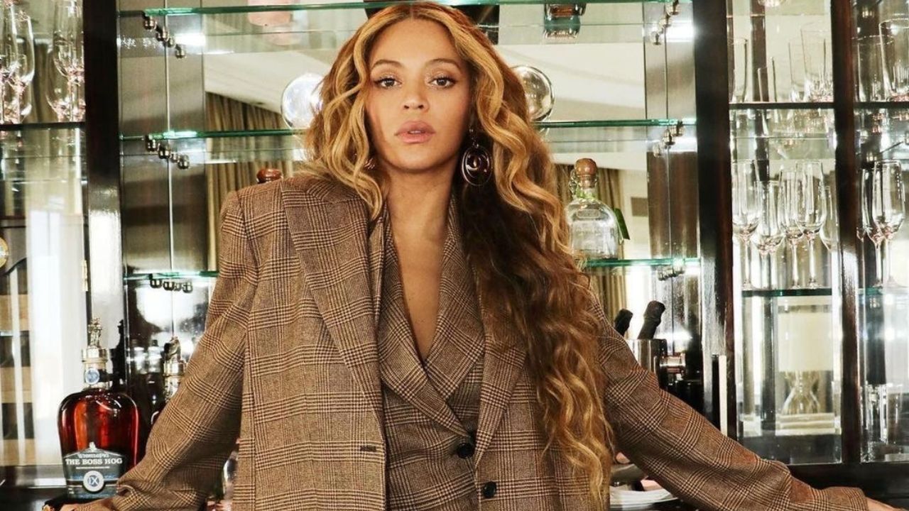 Beyoncé Takes On London in a Brown Plaid Michael Kors Suit with Nude Louboutin Pumps