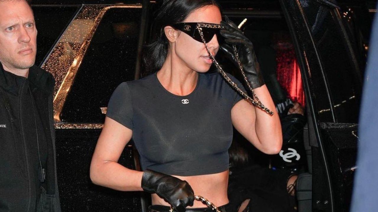Kim Kardashian Wore a Black Chanel Crop Top, Leather Pants and Quilted bag as she Arrived to New York for the MET Gala