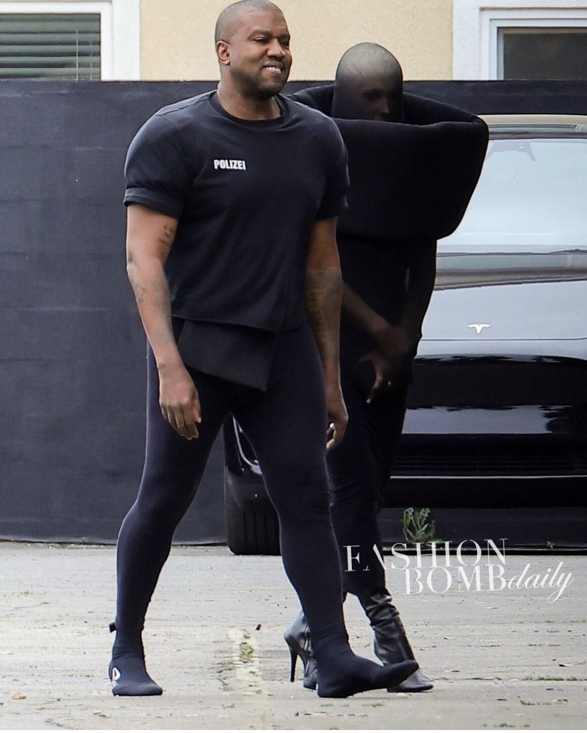 Kanye West Wore His Black Signature Vetements 'Polizei' Shirt and Leggings  with wife Bianca Censori Who Channeled Maison Margiela – Fashion Bomb Daily