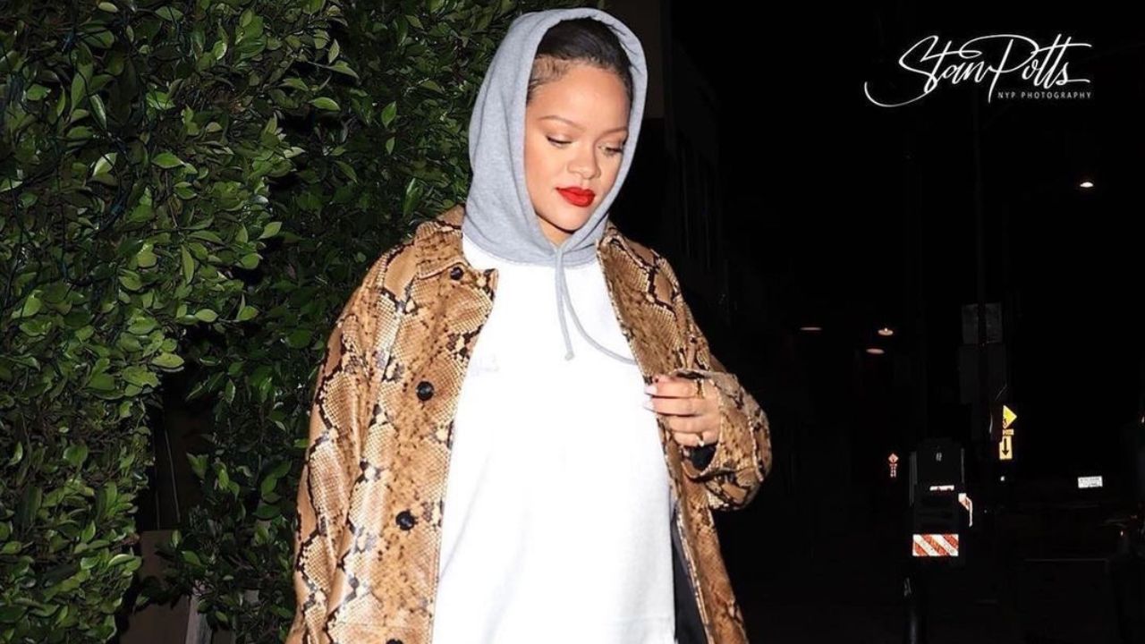 Rihanna Stepped Out in a Grey Vetements Hoodie Layered with a Snakeskin Trench and Tom Ford Heels