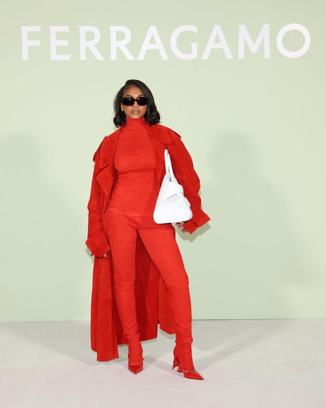 Trend Bomb Pattern: Fiery Pink Will Steal the Present this Fall with Lori Harvey Noticed in an all Pink Ferragamo Look,  Usher in a Pink Marni Go well with, and Kylie Jenner
