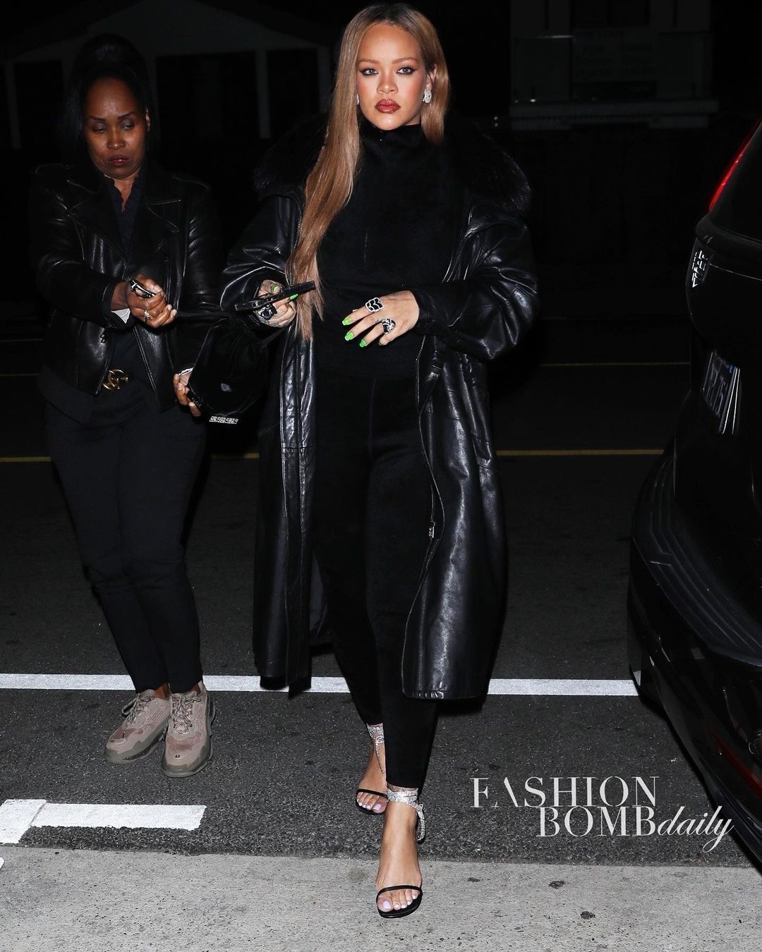 Rihanna Slayed the Scene in a Black Vintage Versace Leather Trench with Crystal Embellished Amina Muaddi Heels 1