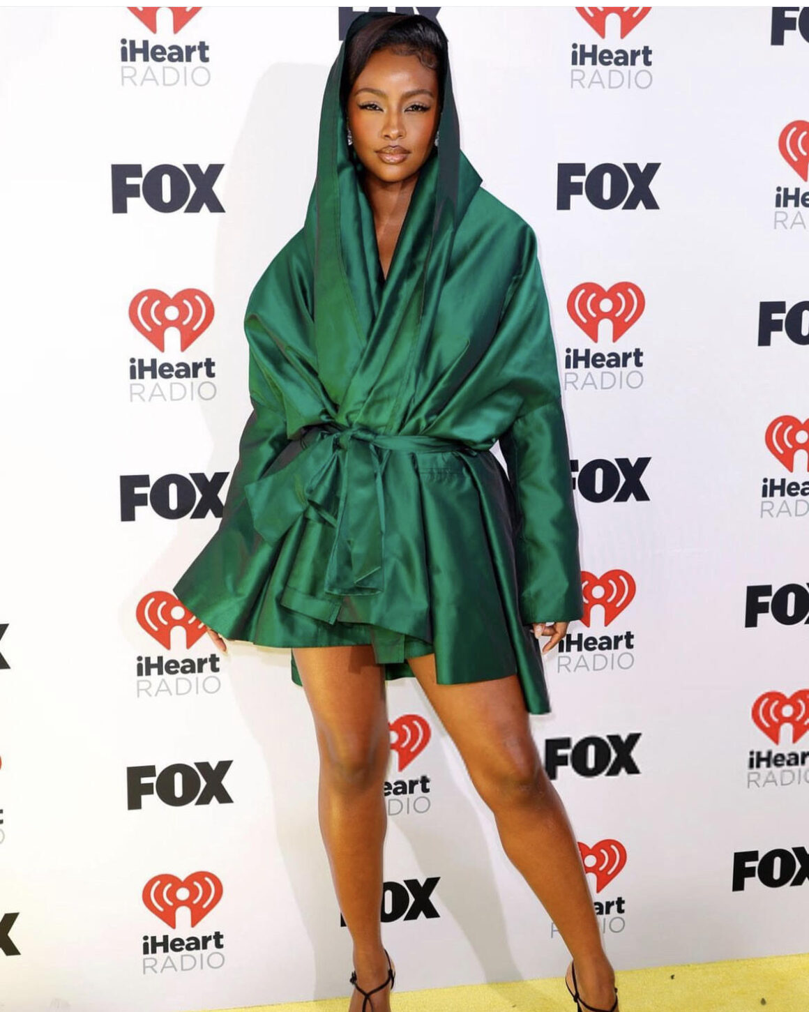 On the Scene at the iHeart Music Awards Beyonce Wins Big in a Black Vintage Versace Look Jennifer Hudson in Taller Marmo Latto in Fanci Club More 2