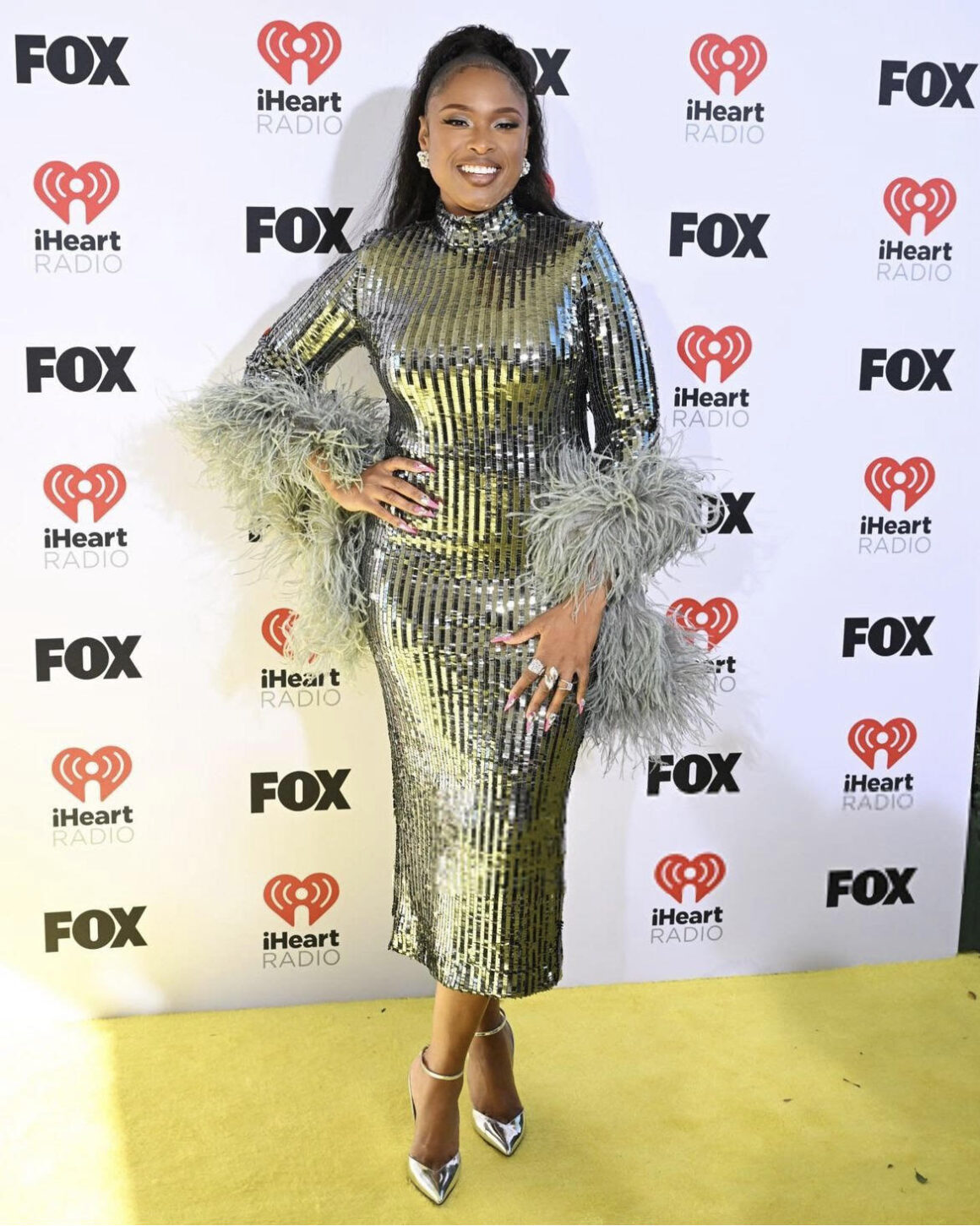 On the Scene at the iHeart Music Awards Beyonce Wins Big in a Black Vintage Versace Look Jennifer Hudson in Taller Marmo Latto in Fanci Club More 5