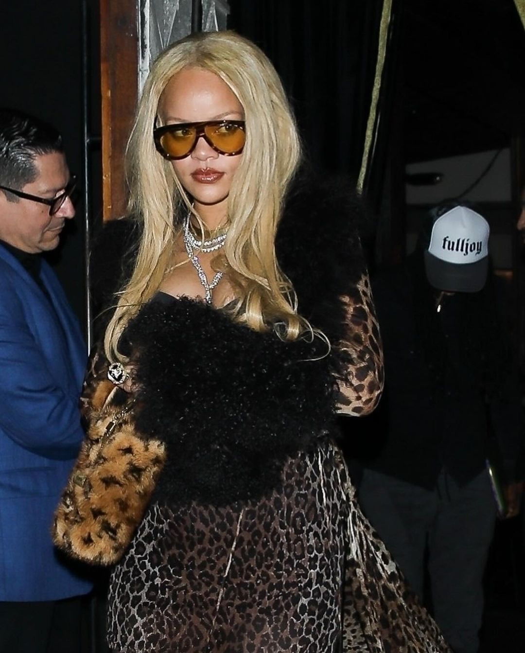 Rihanna Steps Out in a Leopard Dolce Gabbana Look with a Louis Vuitton Fur Monogram Bag and Tom Ford Shades 1