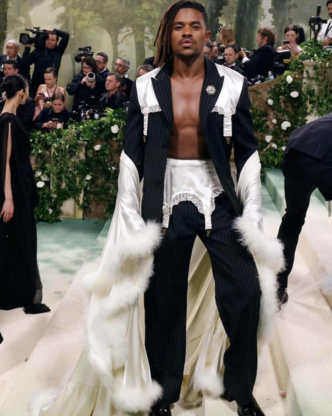 Our Top 10 Best Dressed Men at The Met Gala 2024 including Usher in McQueen Bad Bunny in Maison Margiela Coleman Domingo in Willy Chavarria Jeremy Pope in Tanner Fletcher More 3