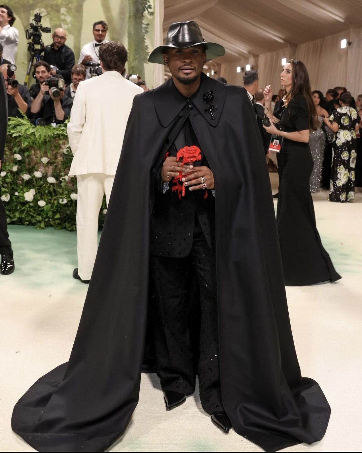 Our Top 10 Best Dressed Men at The Met Gala 2024 including Usher in McQueen Bad Bunny in Maison Margiela Coleman Domingo in Willy Chavarria Jeremy Pope in Tanner Fletcher More 5