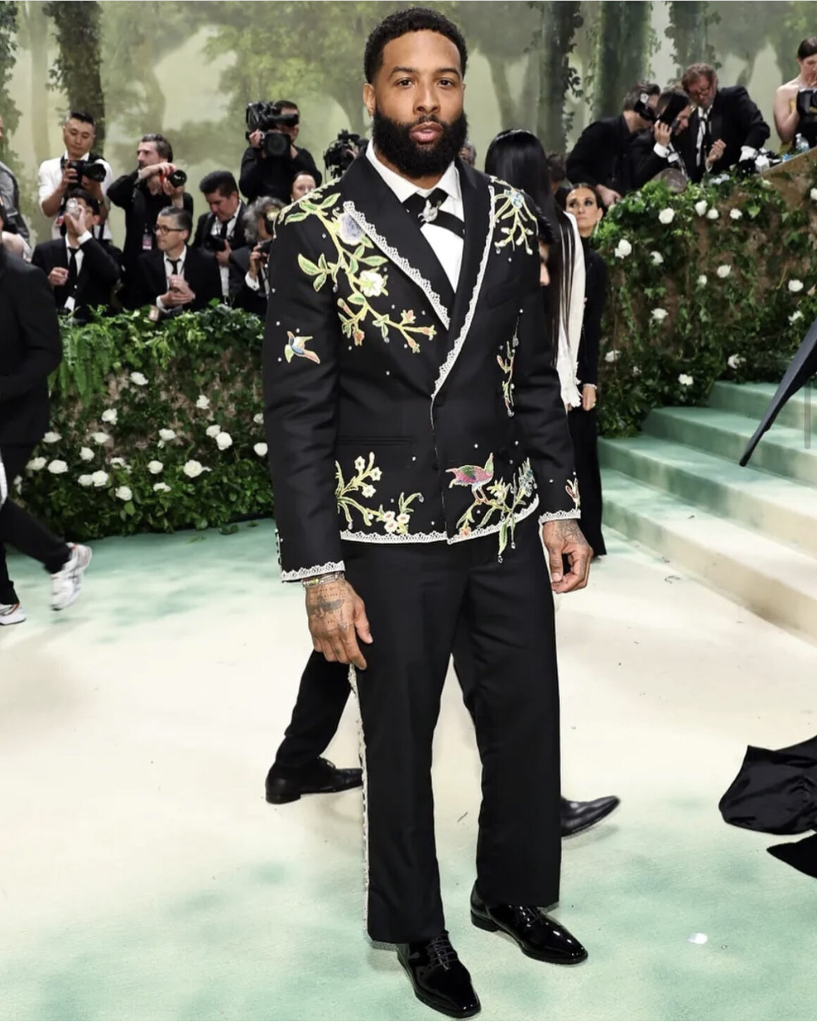 Our Top 10 Best Dressed Men at The Met Gala 2024 including Usher in McQueen Bad Bunny in Maison Margiela Coleman Domingo in Willy Chavarria Jeremy Pope in Tanner Fletcher More 8