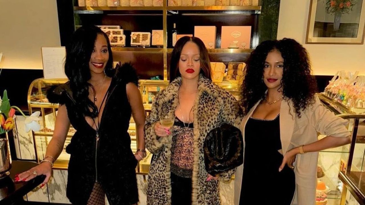 Rihanna Posed in a $1,300 The Attico Lace Camisole with $1,410 Black The Attico Snap Button Jeans