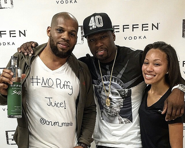 Men’s Fashion Flash: 50 Cent’s Effen Vodka Event Neil Barrett Abstract Print Statue of Liberty T-Shirt + His Givenchy Tyson Orange, Yellow, and Black Leather Sneakers